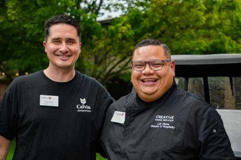 Coty Seaver and Luis Aljona pictured in black shirts in front of trees.