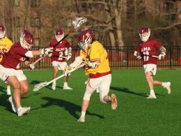 Calvin University men's lacrosse competing on the field