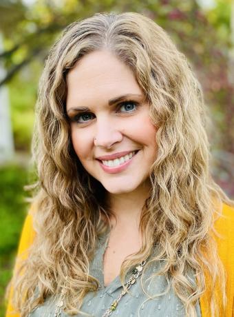 White woman with curly hair