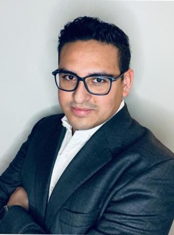 Headshot of Adrian Sanchez