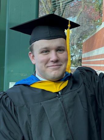 Mason Kolanowski smiling graduation photo