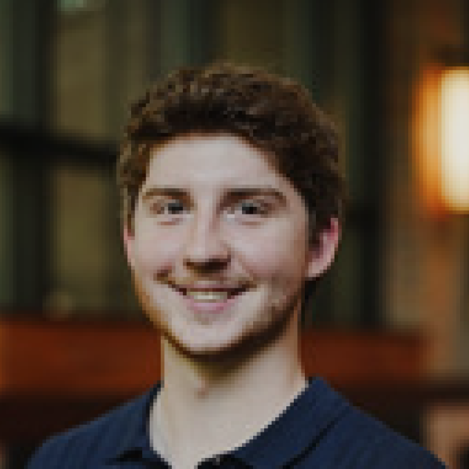 Owen Baker smiling headshot