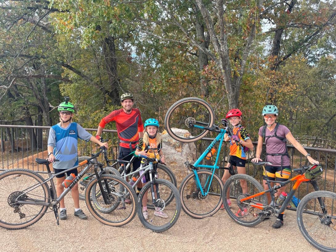 White family enjoying a mountain bike trip in Bentonville, Arkansas