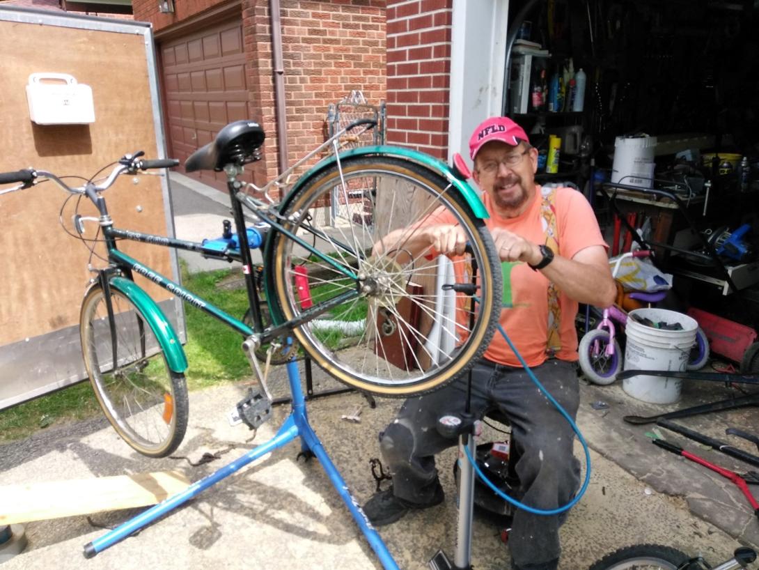 Steve Frieswick ex'73 working on a bike