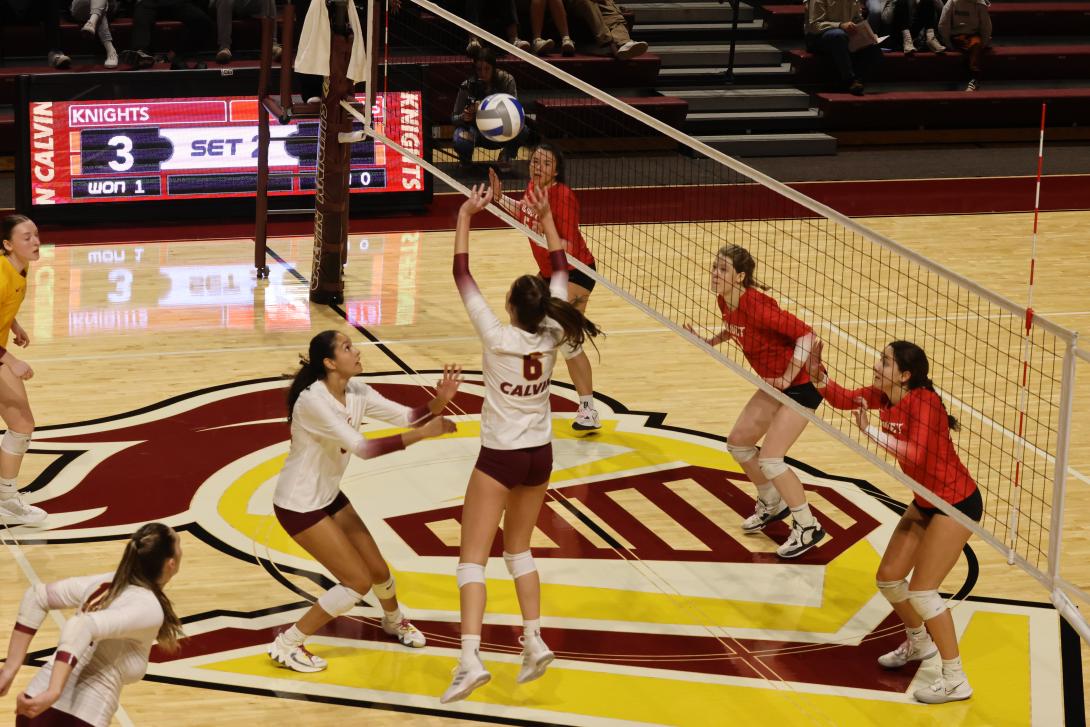 Calvin University women's volleyball team in action