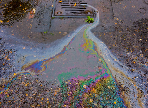 Oil flowing into stormdrain