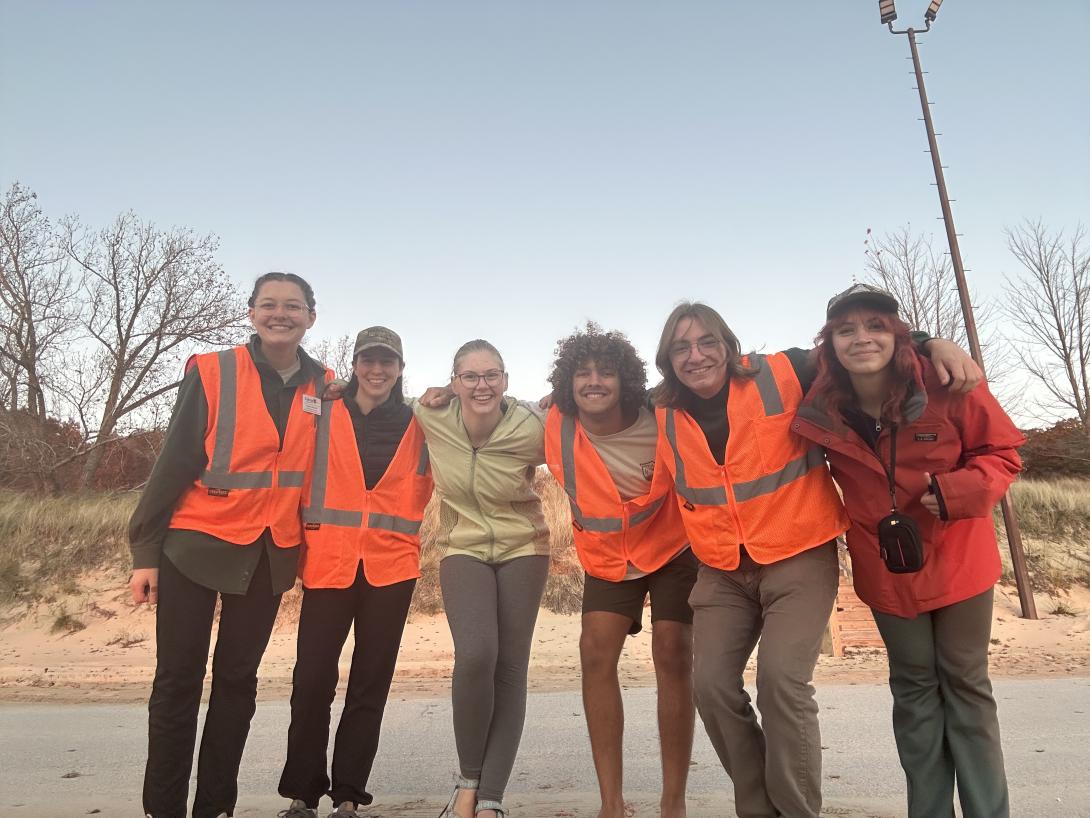 FYRES research team near their blowout site where they investigated plant succession and dune activity.