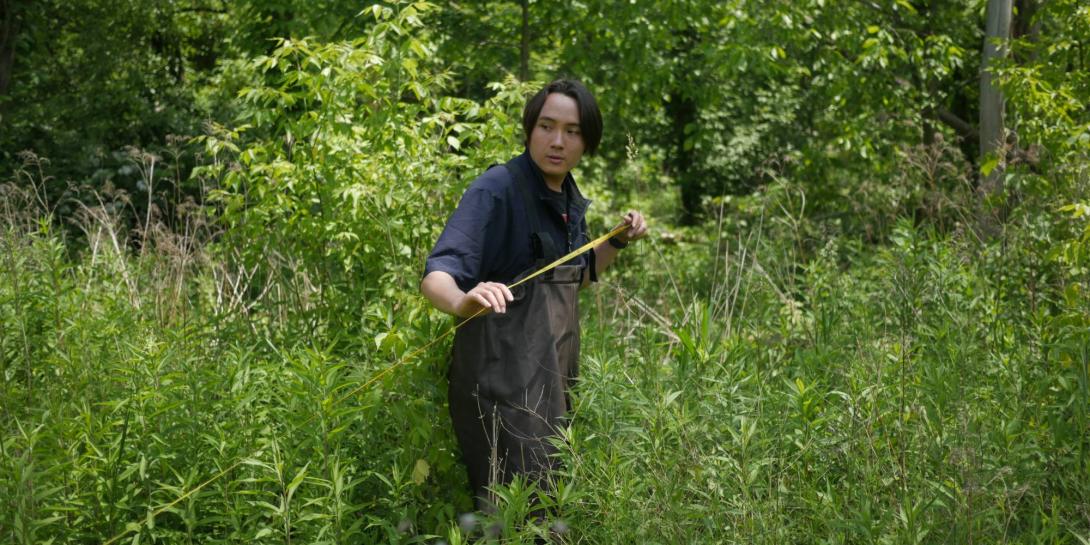 Andrew Slagter doing research for Calvin University in the Plaster Creek Watershed