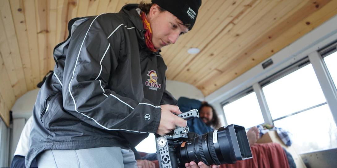 Josh Moyer '25 operating a camera on a film production