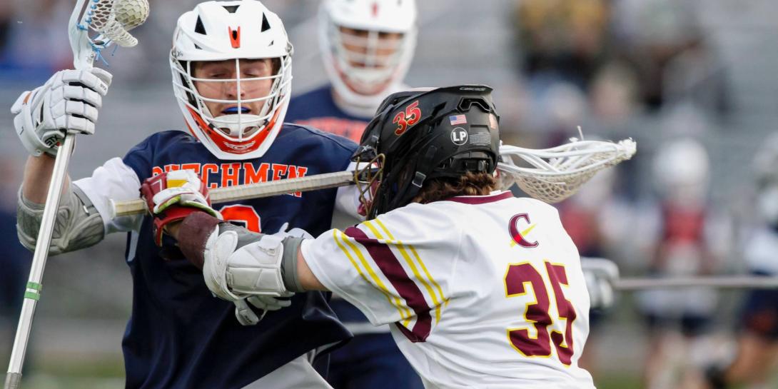 Josh Moyer '25 playing lacrosse at Calvin University.