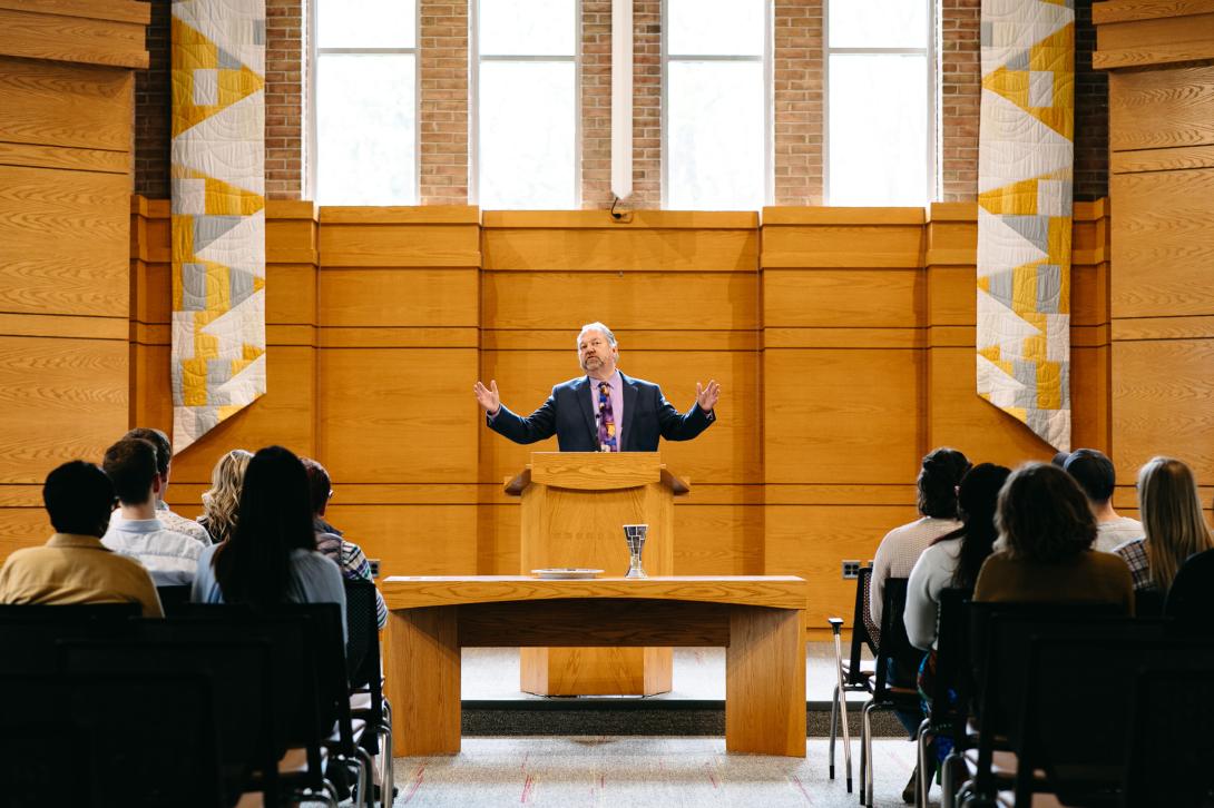 Scott Hoezee preaches at the pulpit in the Calvin Seminary chapel.