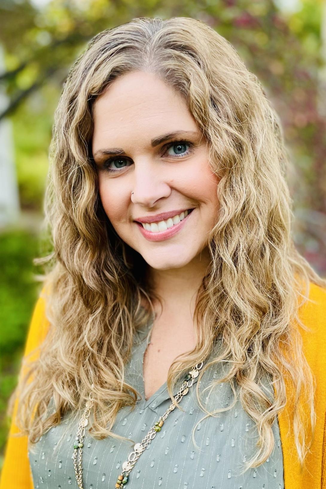 White woman with curly hair