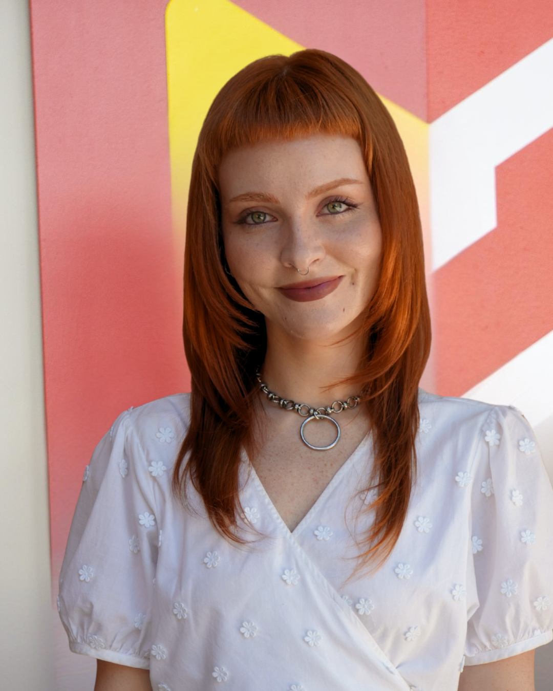 Photo of Kelsey Hooten in front of Calvin logo. 
