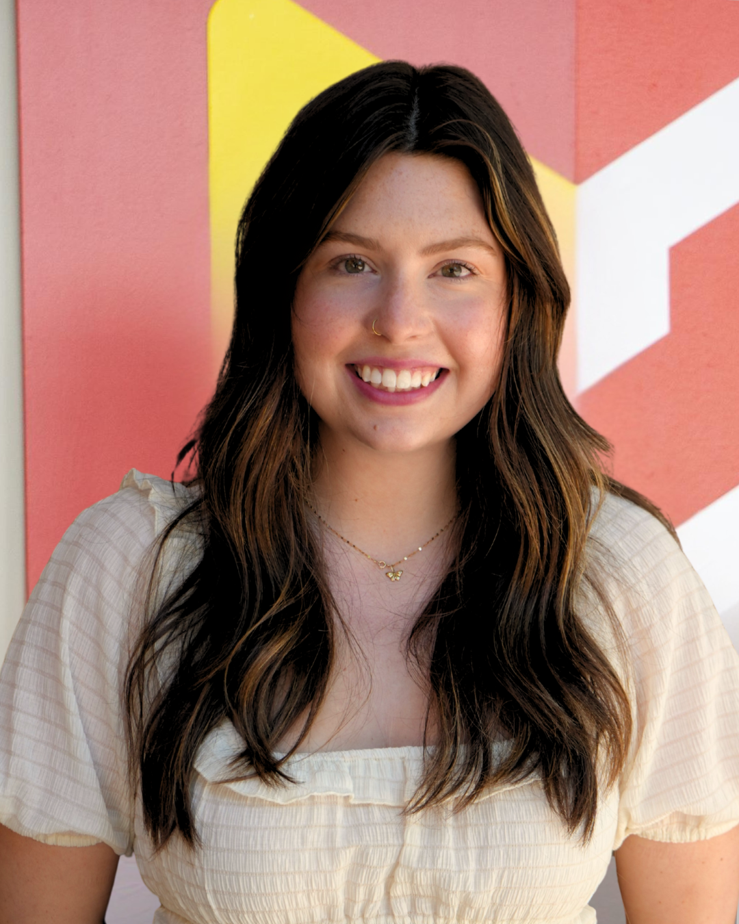 Photo of Abigail Harwood in front of Calvin logo. 