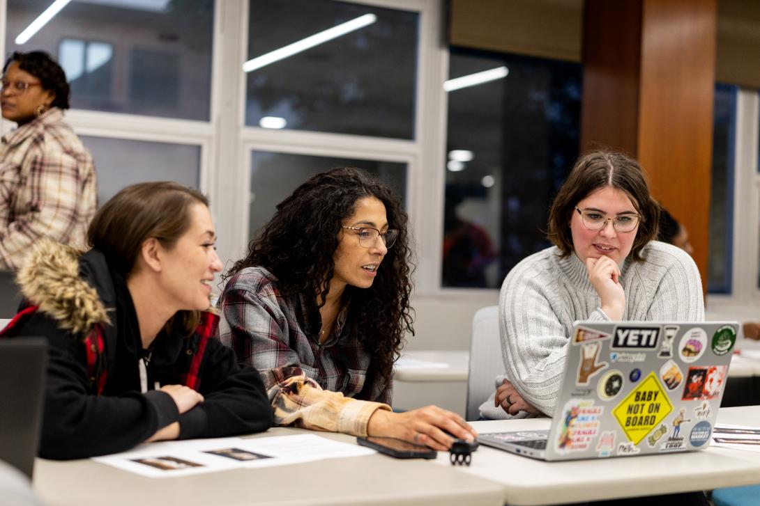 Women working together in a classroom