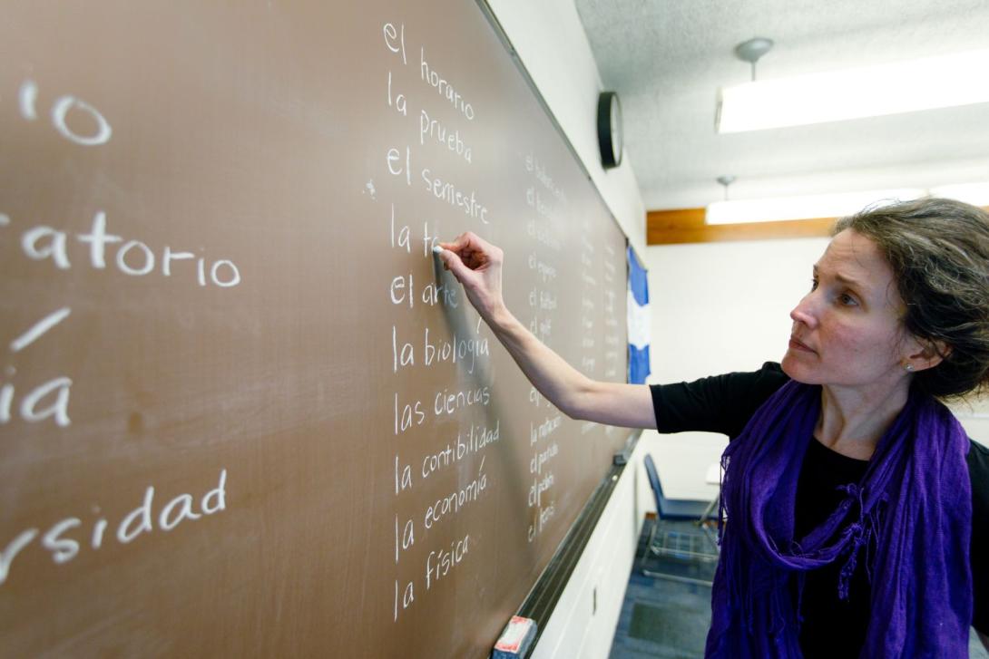 Teacher at a chalkboard