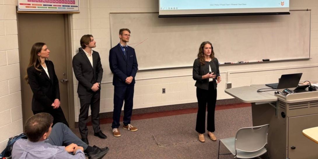 Engineering students giving their final presentation to their customer, Mayor David LaGrand