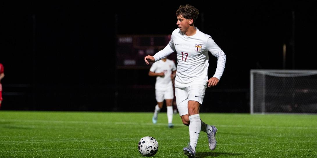 Matt Torrell playing soccer at Calvin University