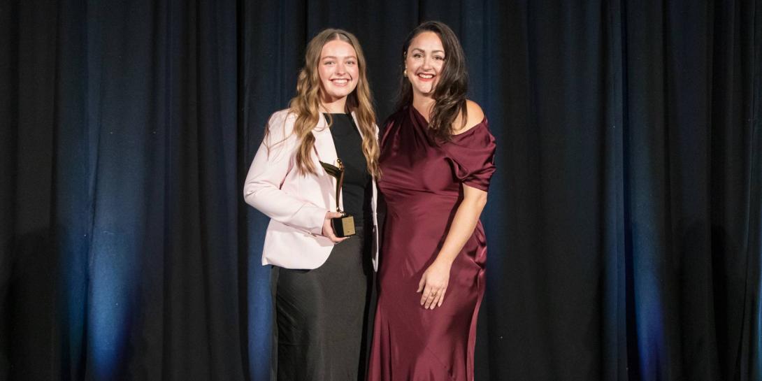 Larissa Bol holds an ADDY Award