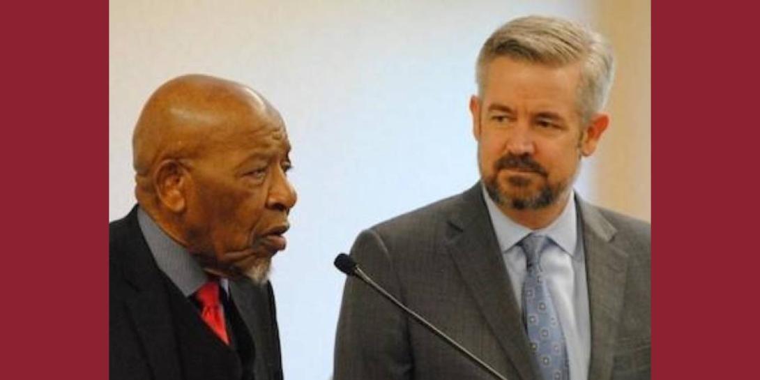 Dr. John Perkins and former Calvin president Michael Le Roy