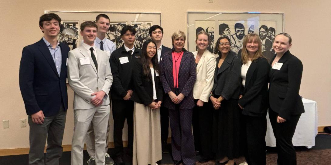 Princess Laurentien takes a photo with a group of Calvin student leaders