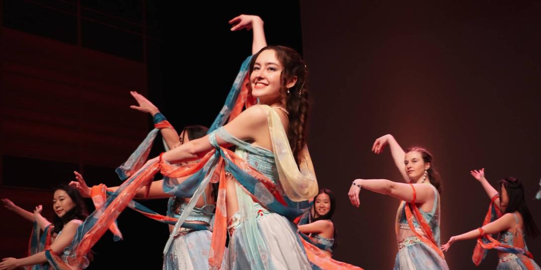 Chantale Van Tassel leads the China Act in Rangeela at Calvin University.