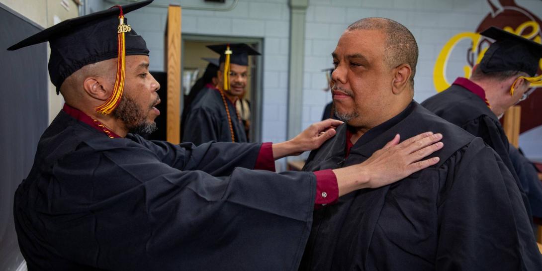 McConnell Adams, Jr. and Eric Clifton-Arnett Rackard getting ready for their 2026 Commencement ceremony at Handlon Correctional Facility.