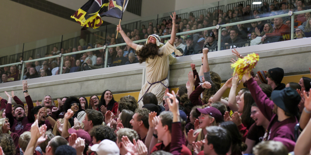 Case Medema dressed up as Moses during a Calvin v Hope rivalry men's basketball game