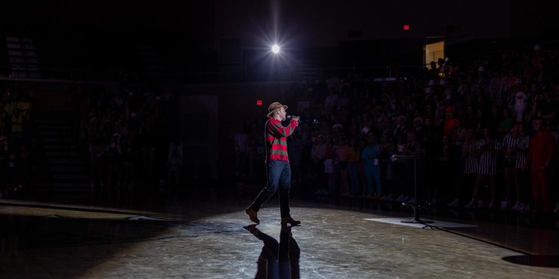 Case Medema welcoming students during MidKnight Madness