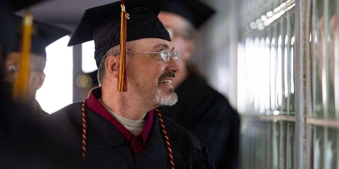 George Kruger in the hallway prior to the graduation ceremony