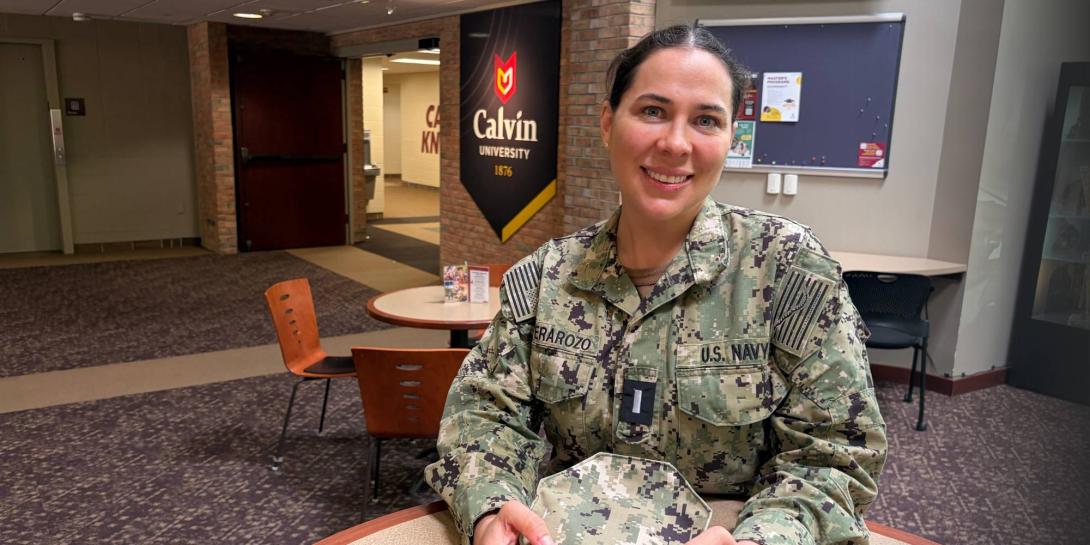 Laura Rivera sitting in the Spoelhof University Center Atrium
