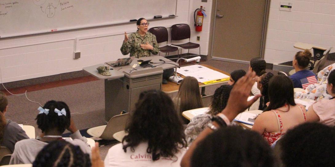 Laura Rivera talks to students during Calvin University's HEALTH Camp.