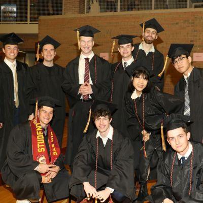 Ael Lee '24 with fellow Calvin graduates