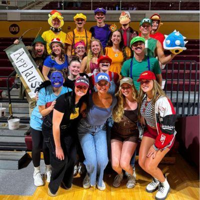 Anna Haverdink with a group of students dressed in Mario Bros costumes