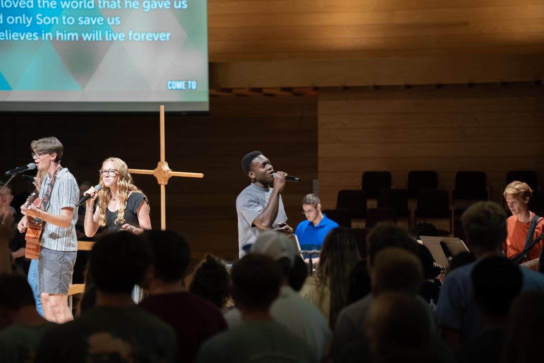 Photo of students worshiping at LOFT