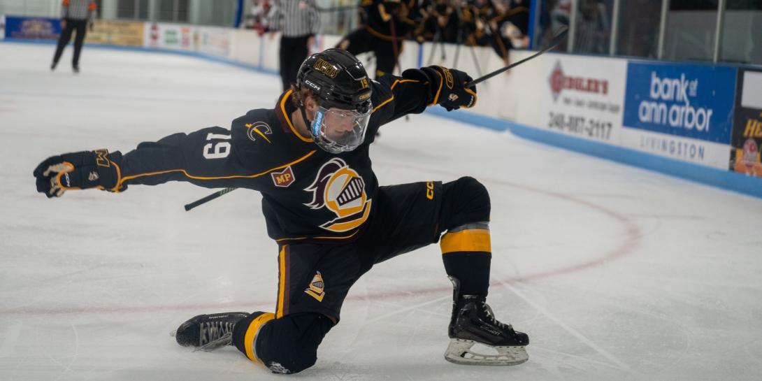 A player on Calvin's ACHA D1 Hockey Team celebrates on the ice