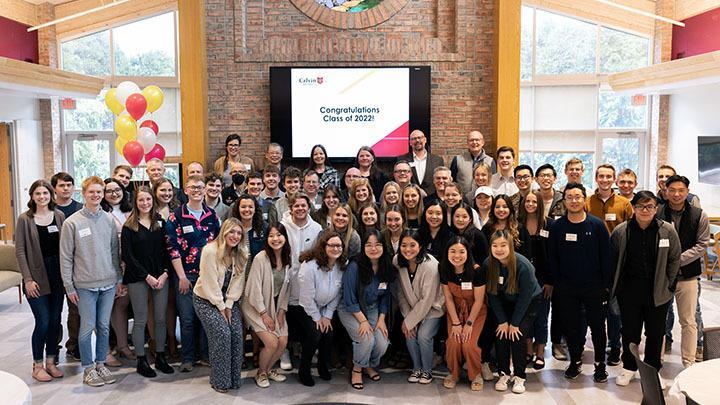 Business students smile at the 2022 awards.