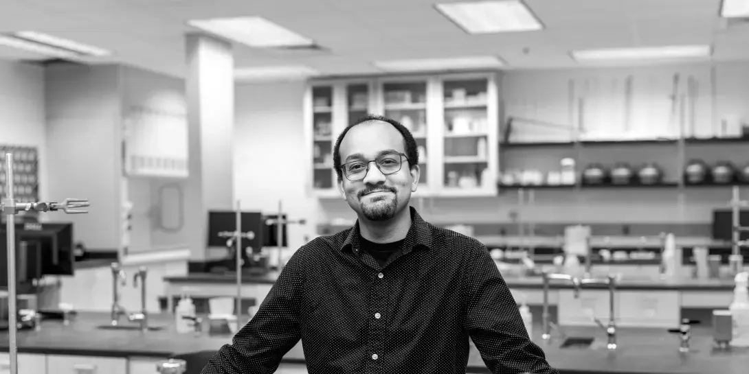 Kwabena Bediako standing in chemistry lab