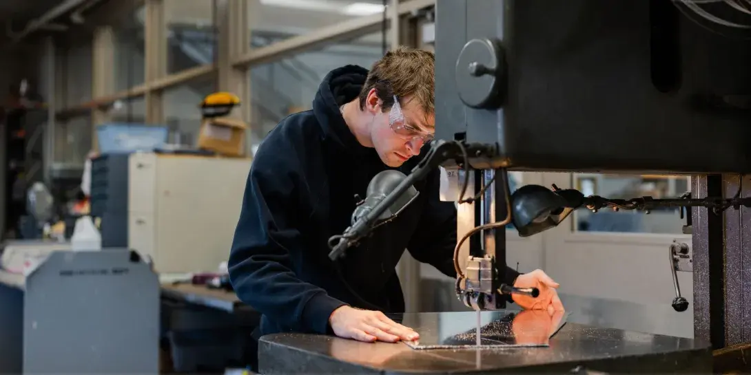 A student working in an engineering lab at Calvin University.