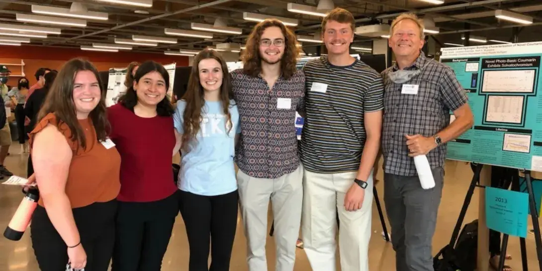 Mark Muyskens (far right) with five of his student researchers
