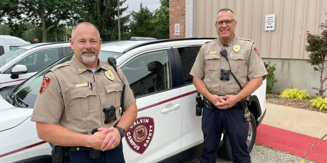 Stan McDonald and Tyson Moore, campus safety officers at Calvin University