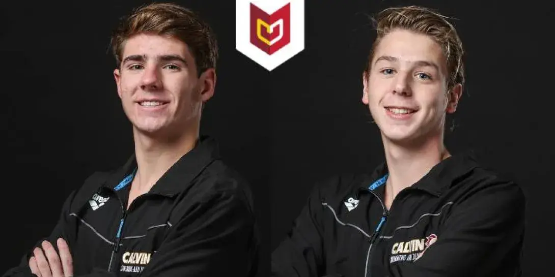 Nathan Koestner and Ryan Halberg in their Calvin University swimming and diving warm ups.