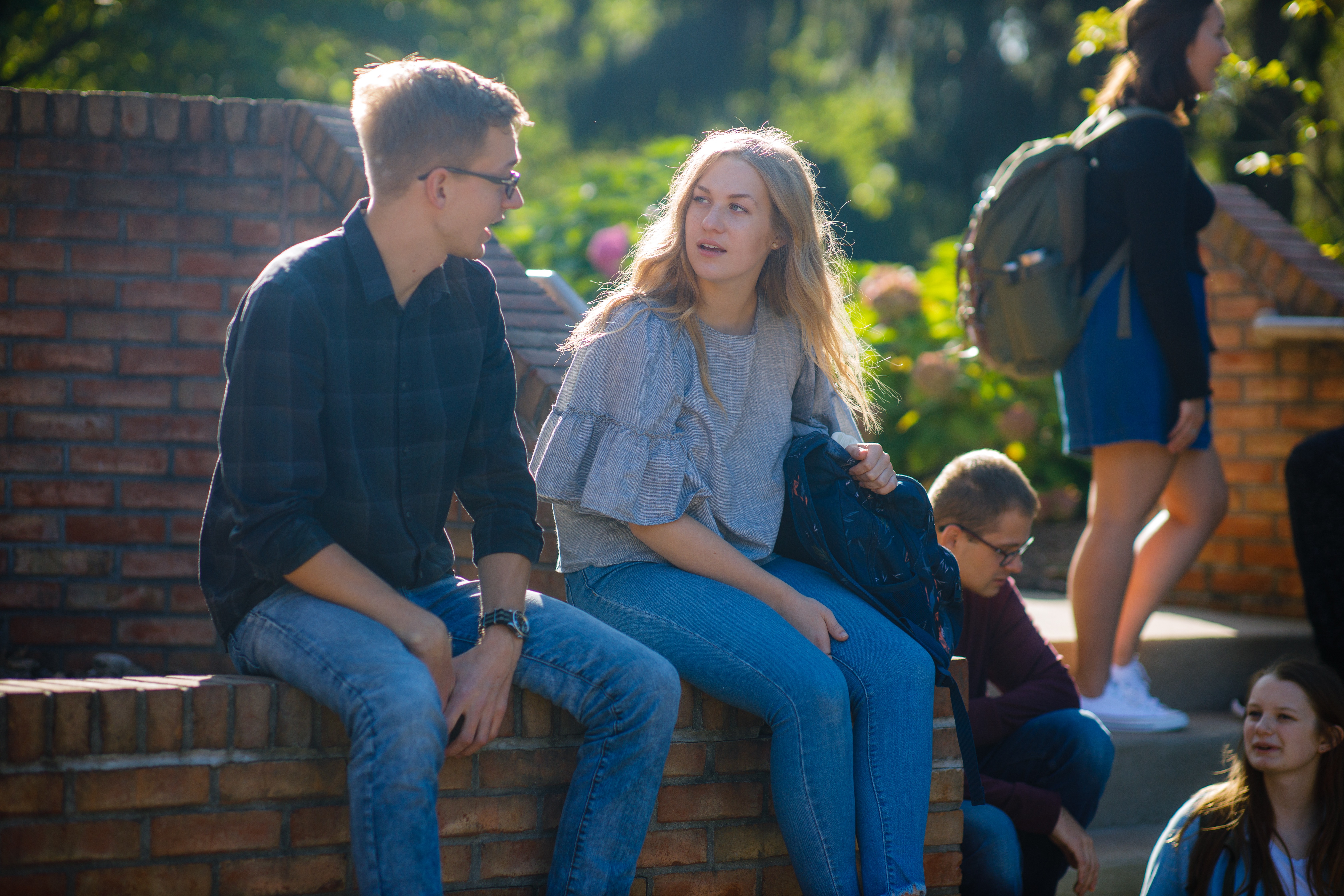 students talking to one another