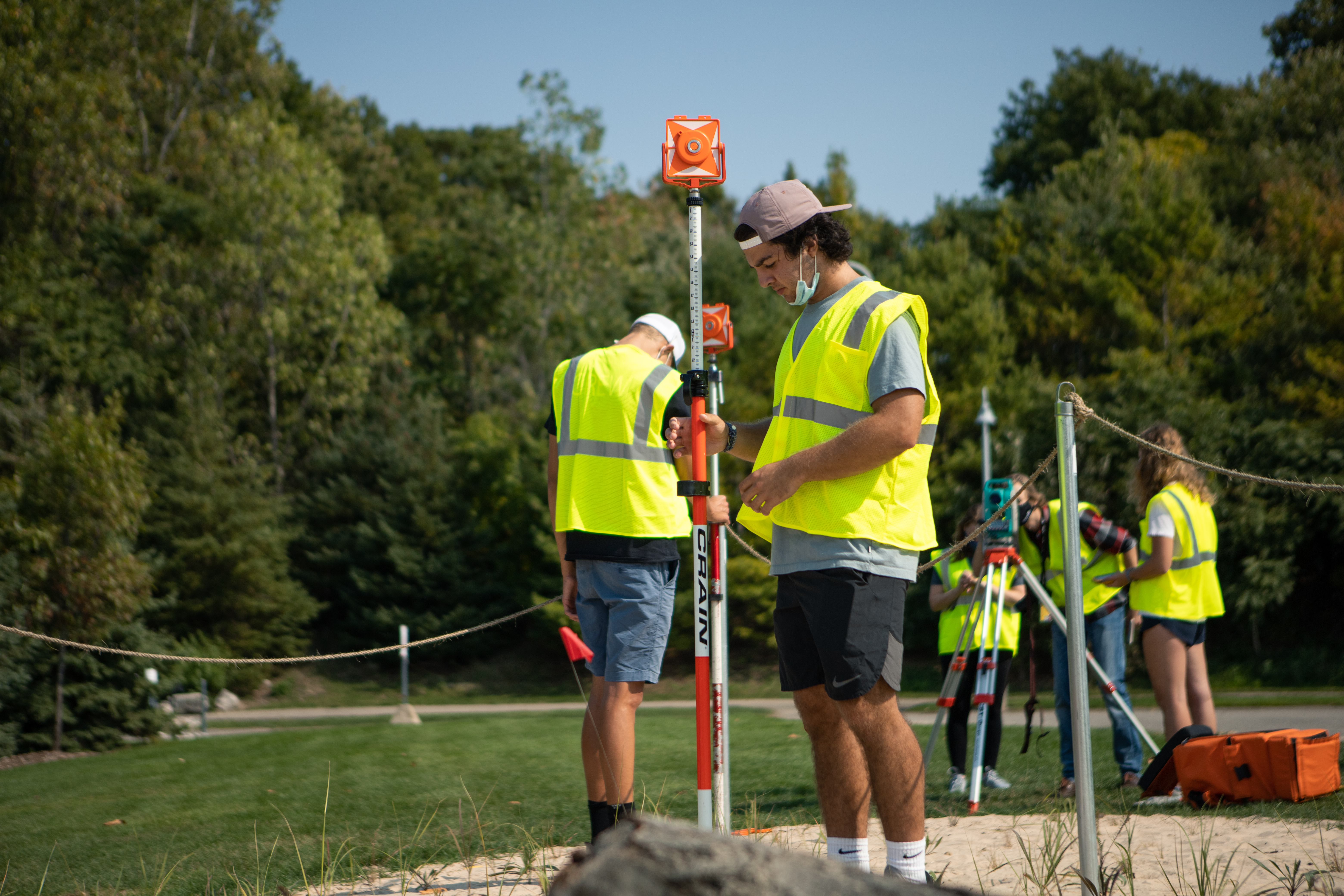 students working on the dunes